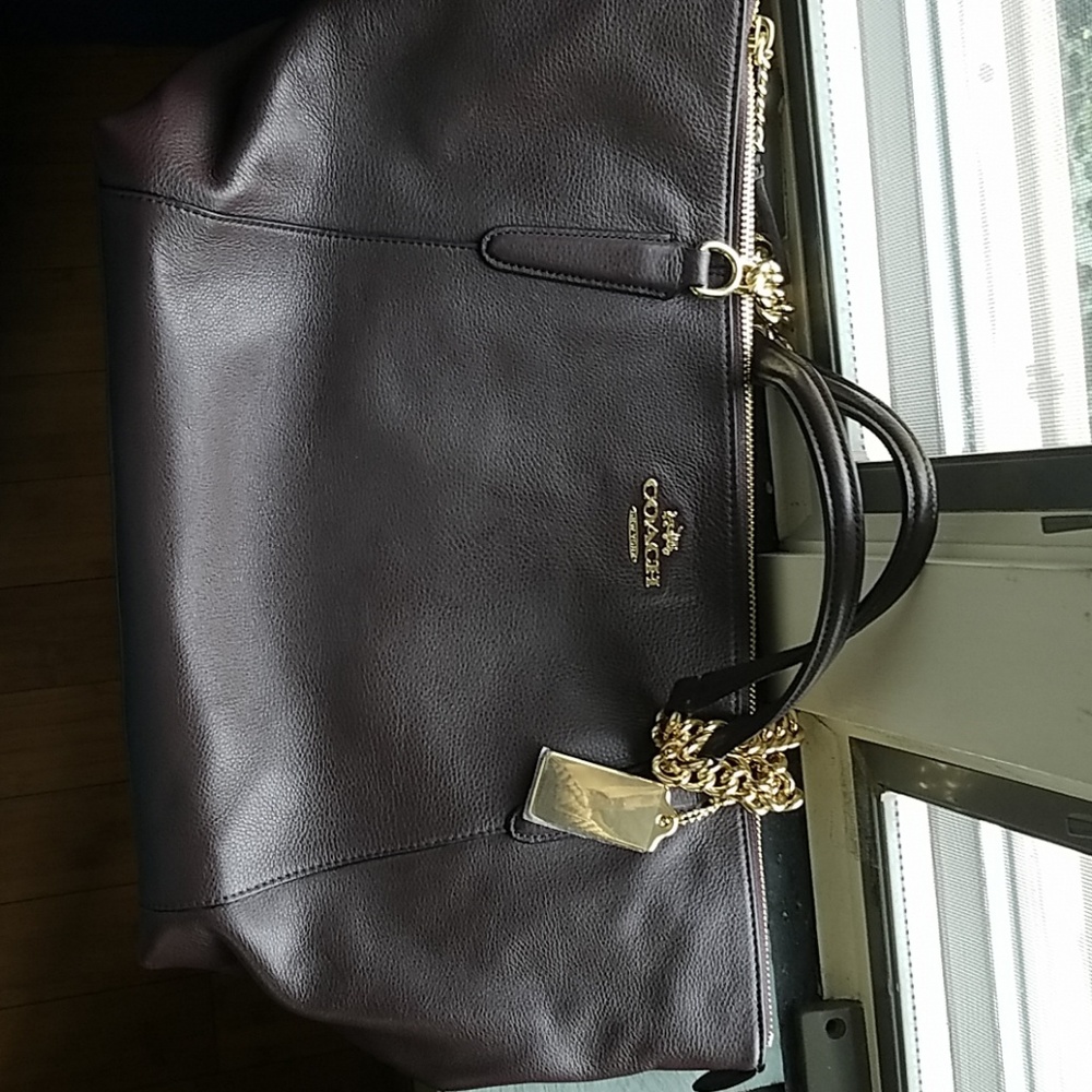 Brown leather coach bag